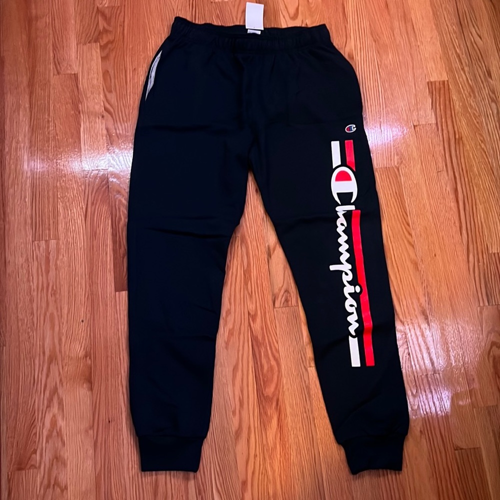 Champion Black Sweatpants with Red & White Logo Stripe